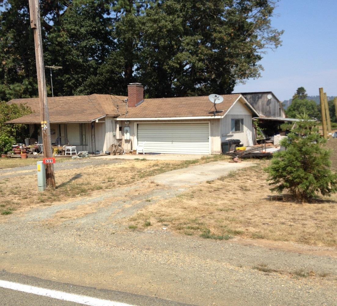 Figure 9 · We only had the two garages built when we lived here in Myrtle Creek.